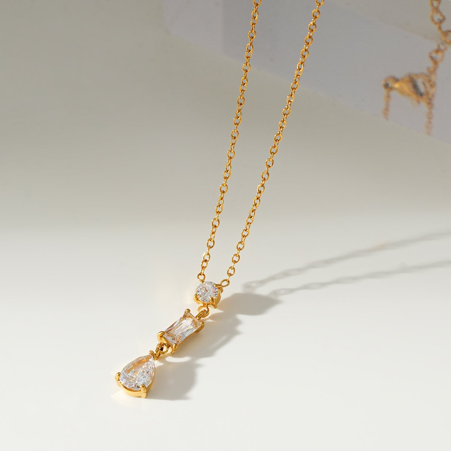 Style ROCHINA Gold:  A Trio of Zirconia Charm Pendant Chain Necklace