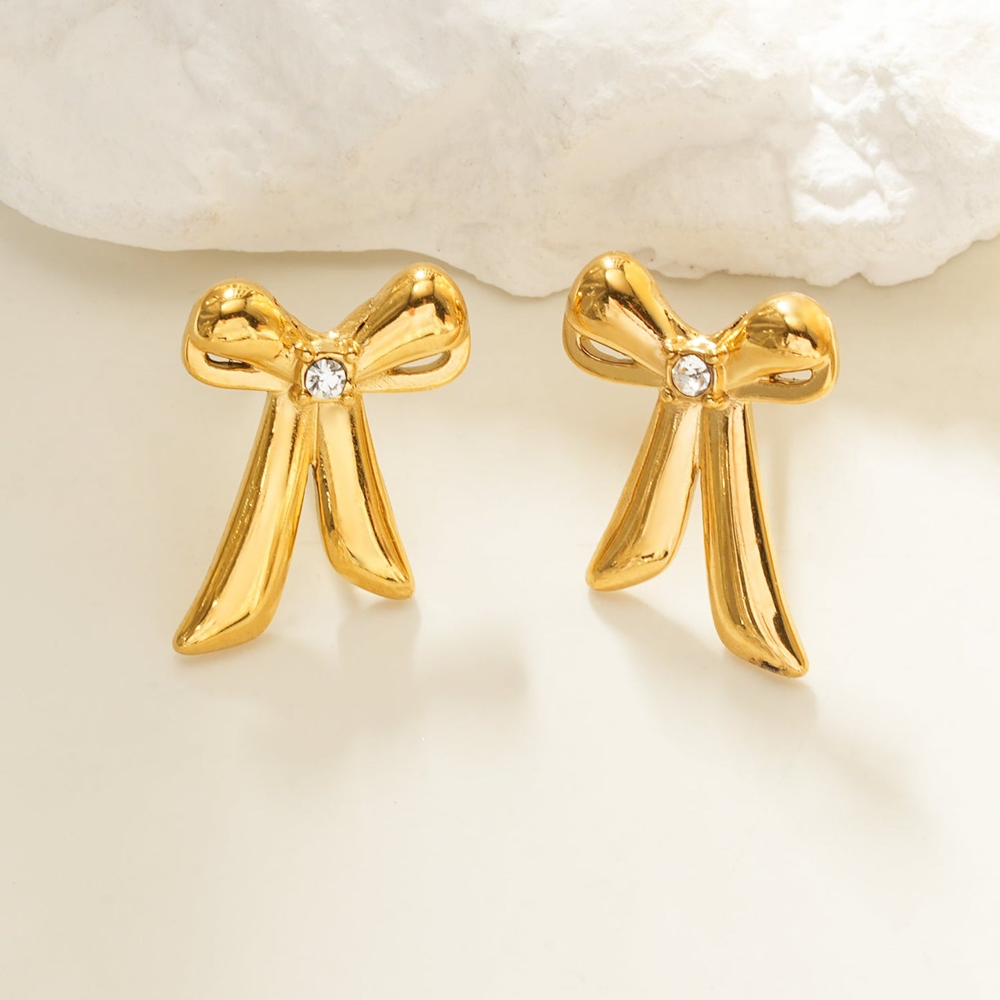 Elegant small bow earrings with sparkling cubic zirconia stone for women
