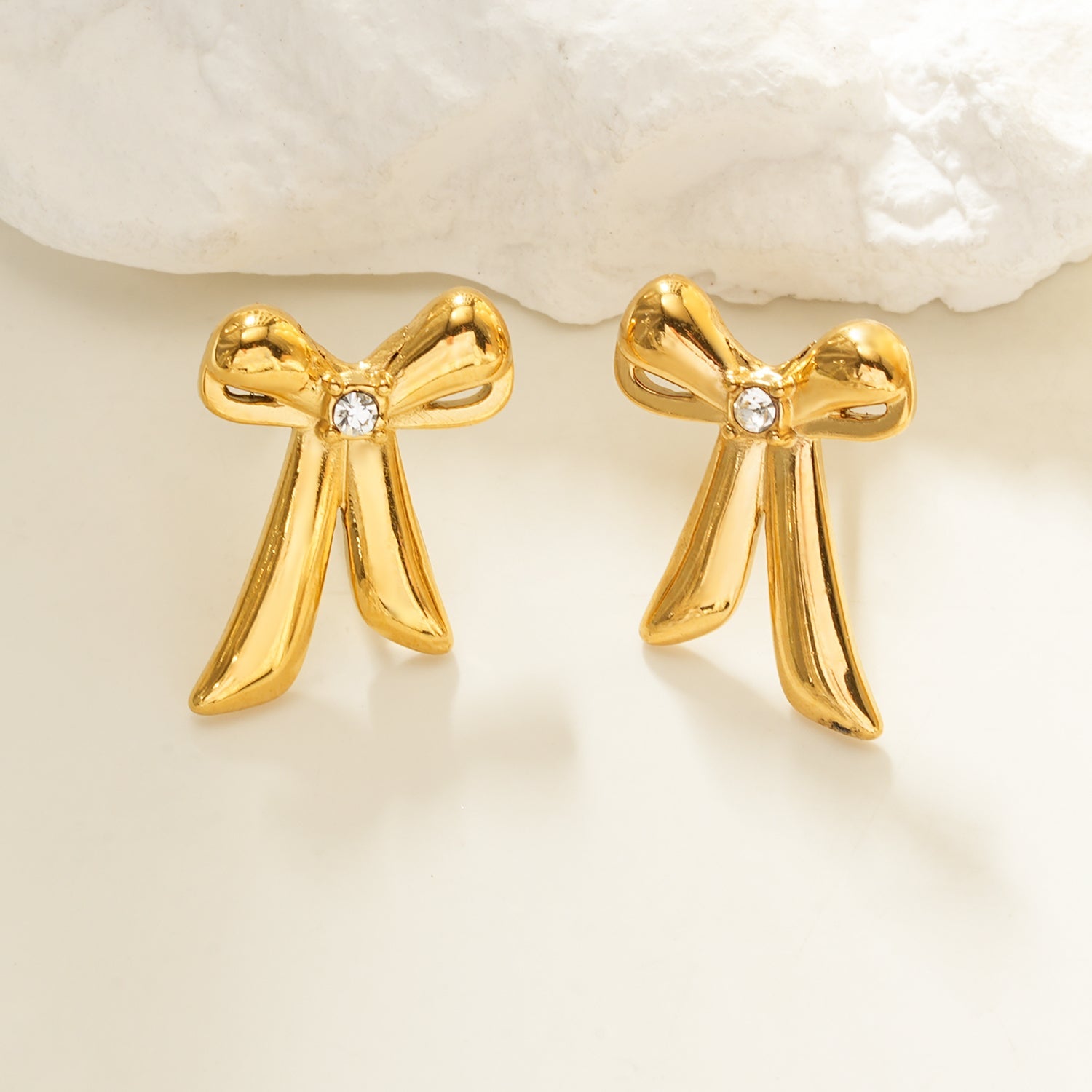 Elegant small bow earrings with sparkling cubic zirconia stone for women
