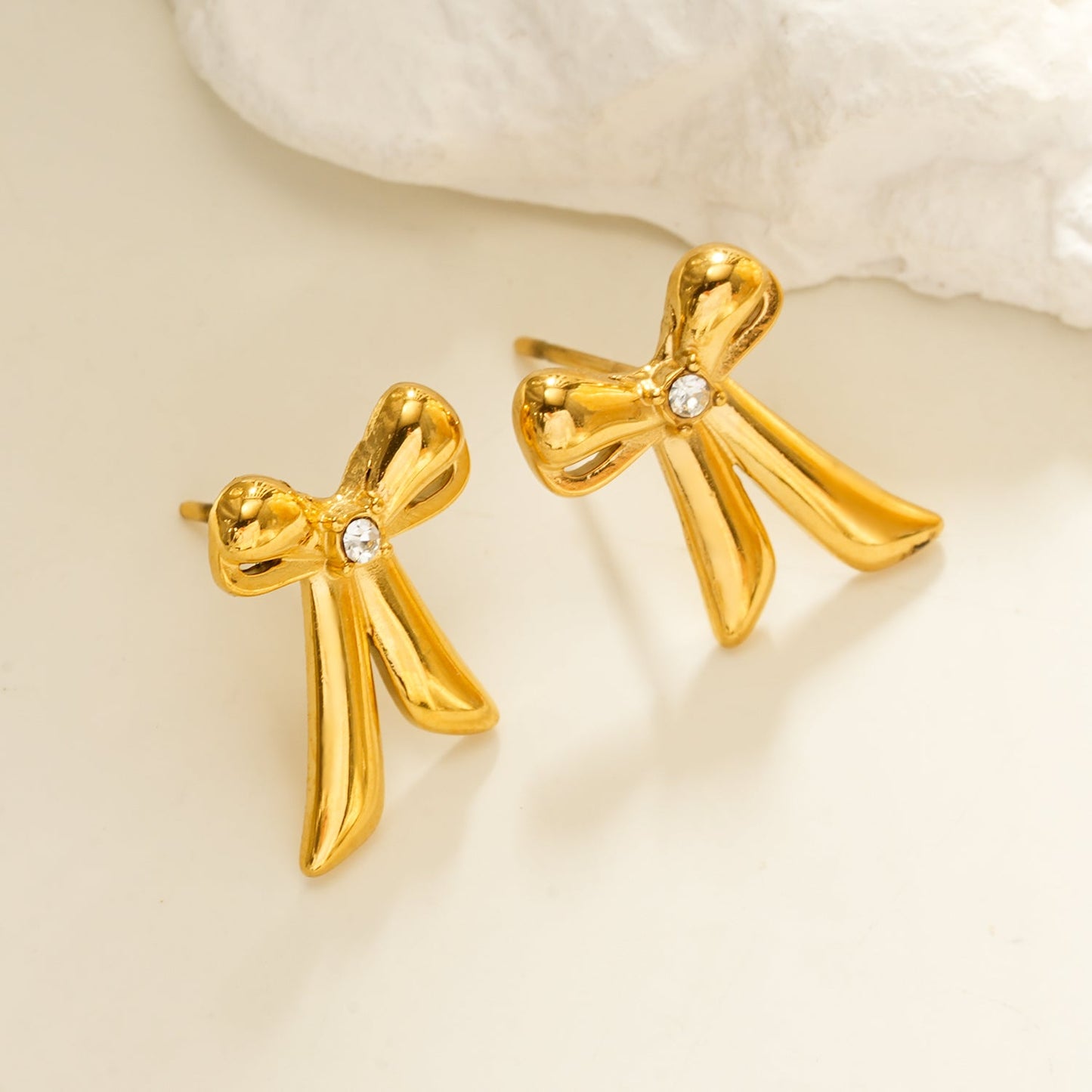 Elegant small bow earrings with sparkling cubic zirconia stone for women