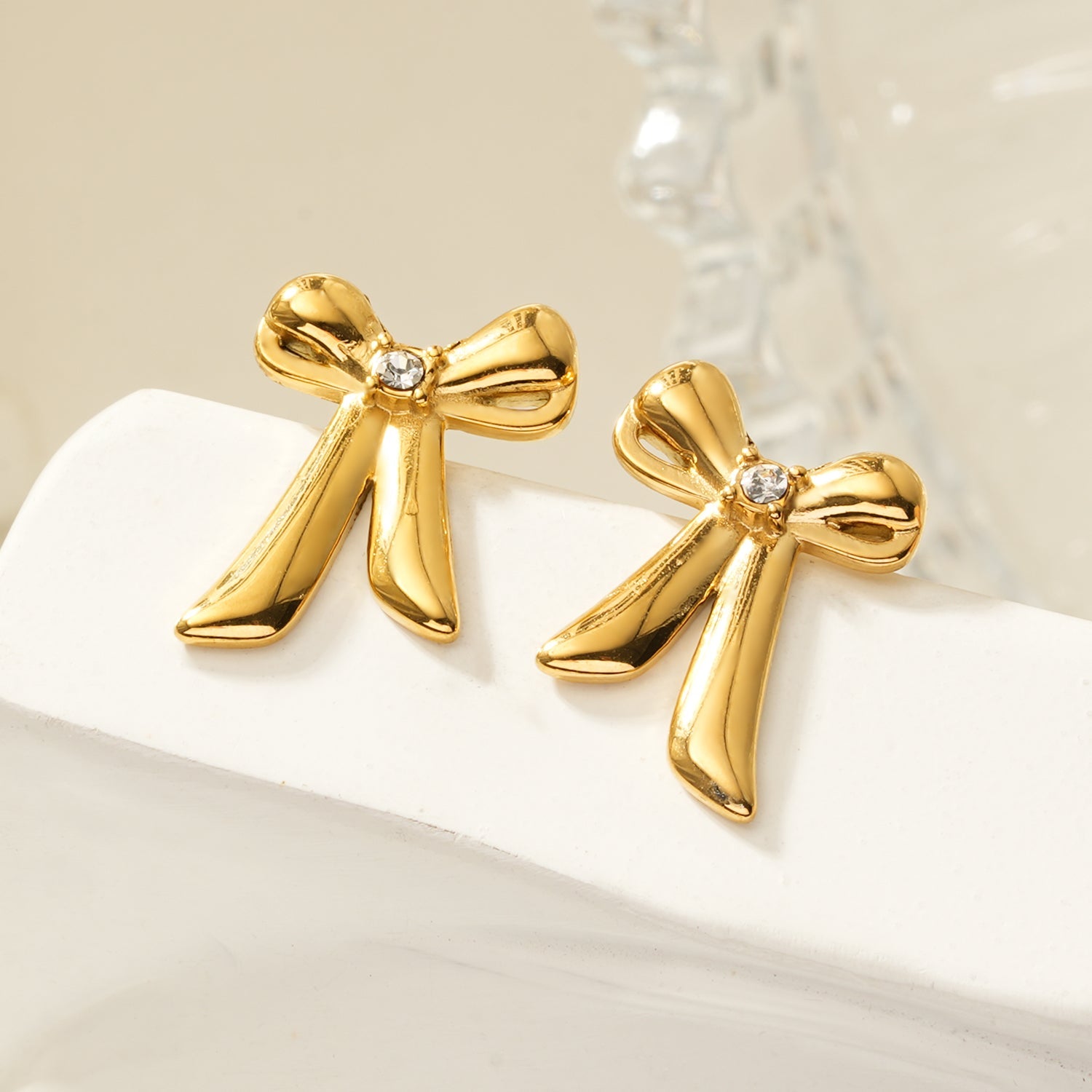 Elegant small bow earrings with sparkling cubic zirconia stone for women