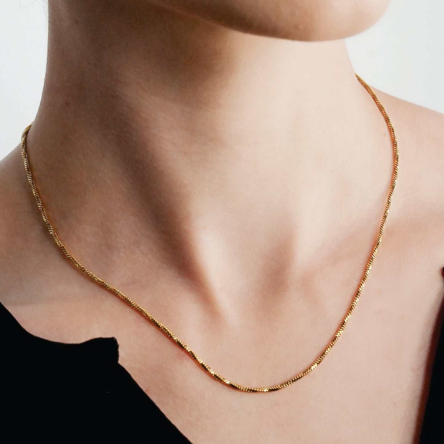 SKAGWAY: Minimalist Twisted Textures Chain Necklace in Gold