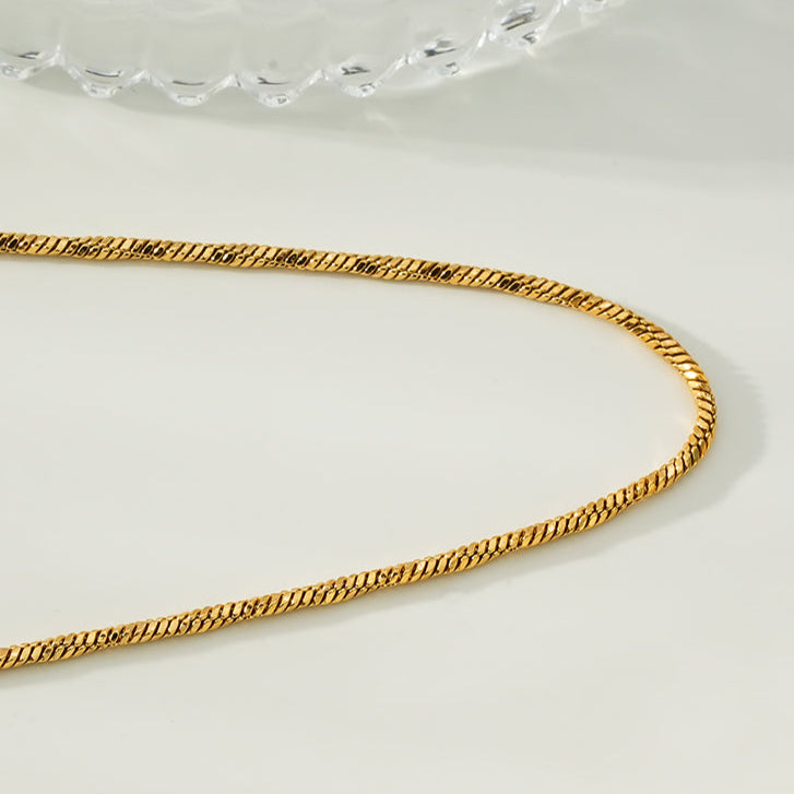 SKAGWAY: Twisted Textures Chain Necklace in Gold