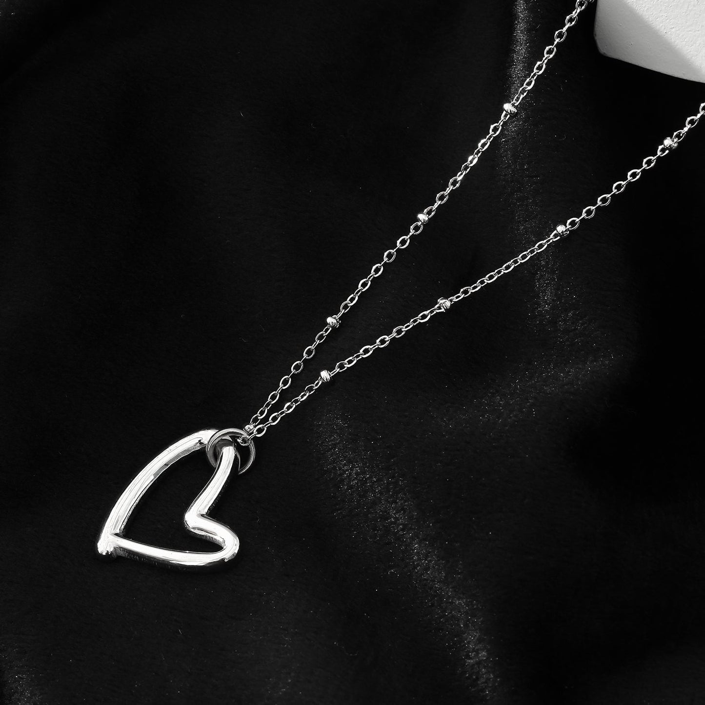 Style SMITTEN: Dainty Beaded Chain Anchoring an Abstract Heart Shaped Pendant in White Gold (Silver Toned)