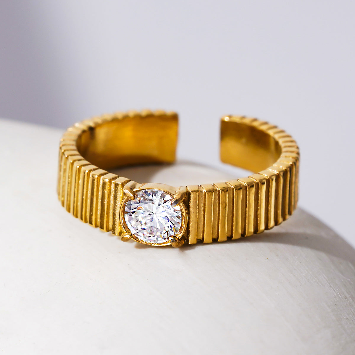 TALA: Art-Deco Style Textured Band Ring with a Round Zirconia Centerpiece