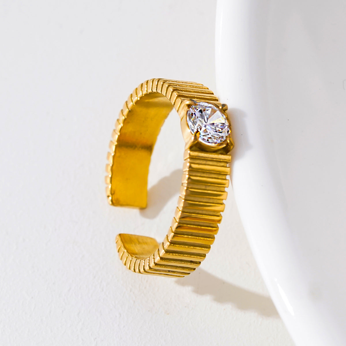 TALA: Art-Deco Style Textured Band Ring with a Round Zirconia Centerpiece