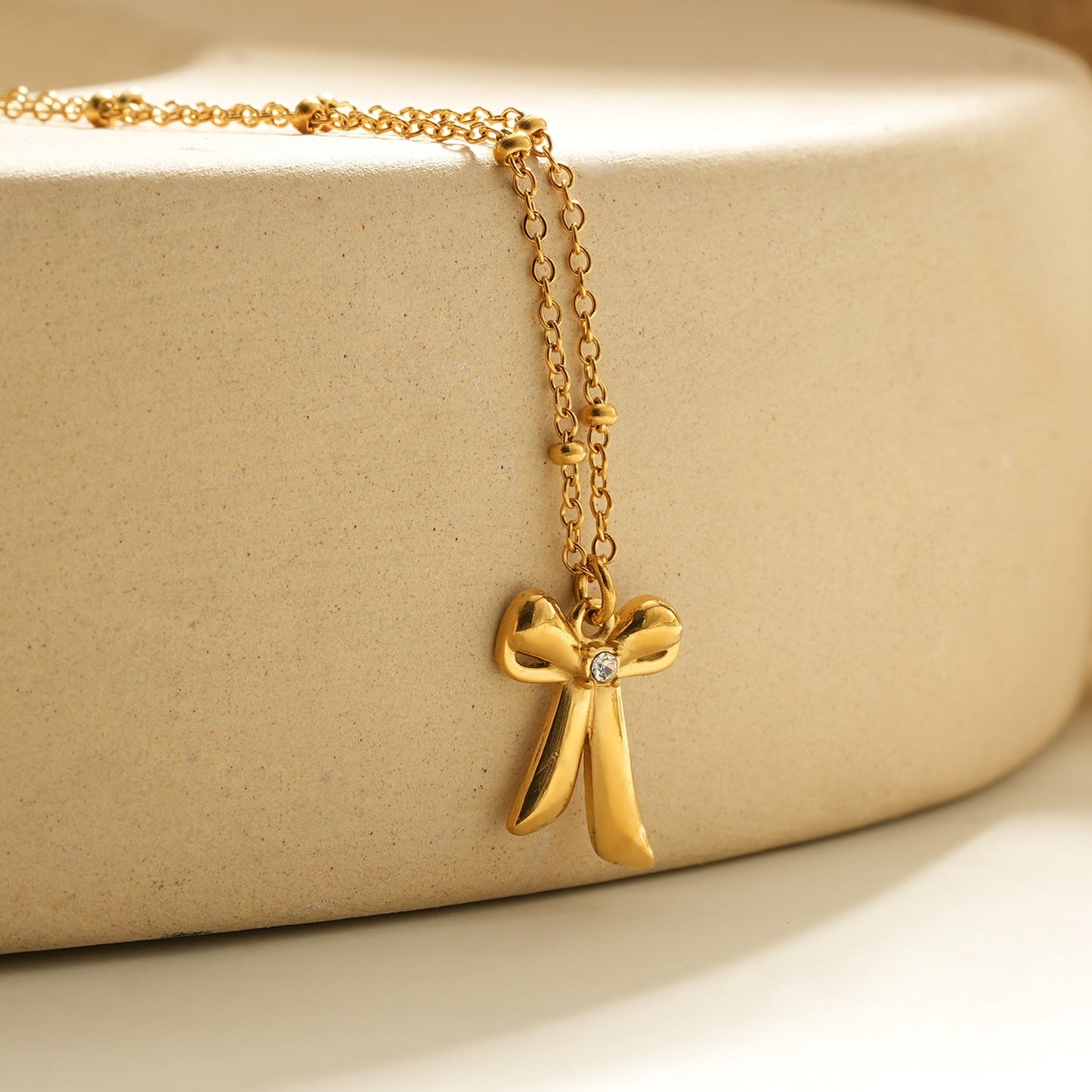 TALIANA Gold: Dainty Beaded Chain Necklace with Bow Pendant & Solitaire Zirconia – Elegant Everyday Jewelry