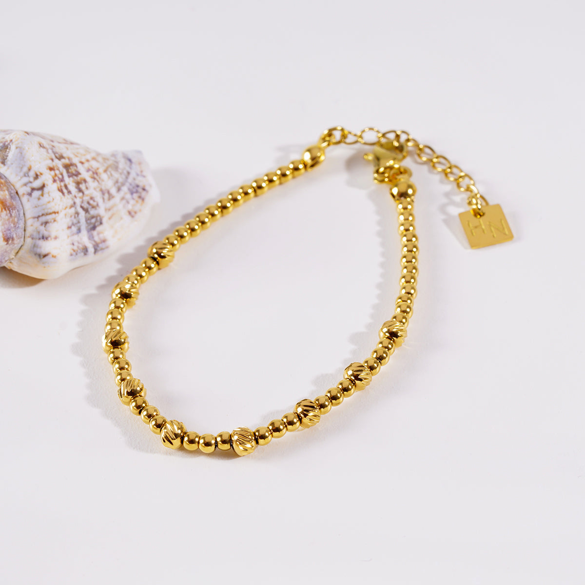 Style ANNABETH 7580: Twin-Bead Fusion Gold Chain Bracelet.