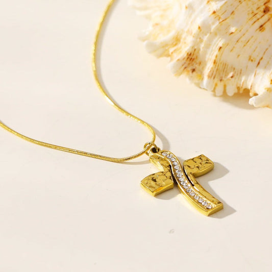 ARCASSA: Zirconia Embedded Hammered Finish Cross Pendant on a Mini Snake Skin Textured Chain Necklace.