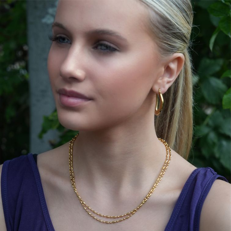 CALIXIA "Sculpted Sophistication: Discover the Allure of Geometric Irregular Hoop Earrings!".