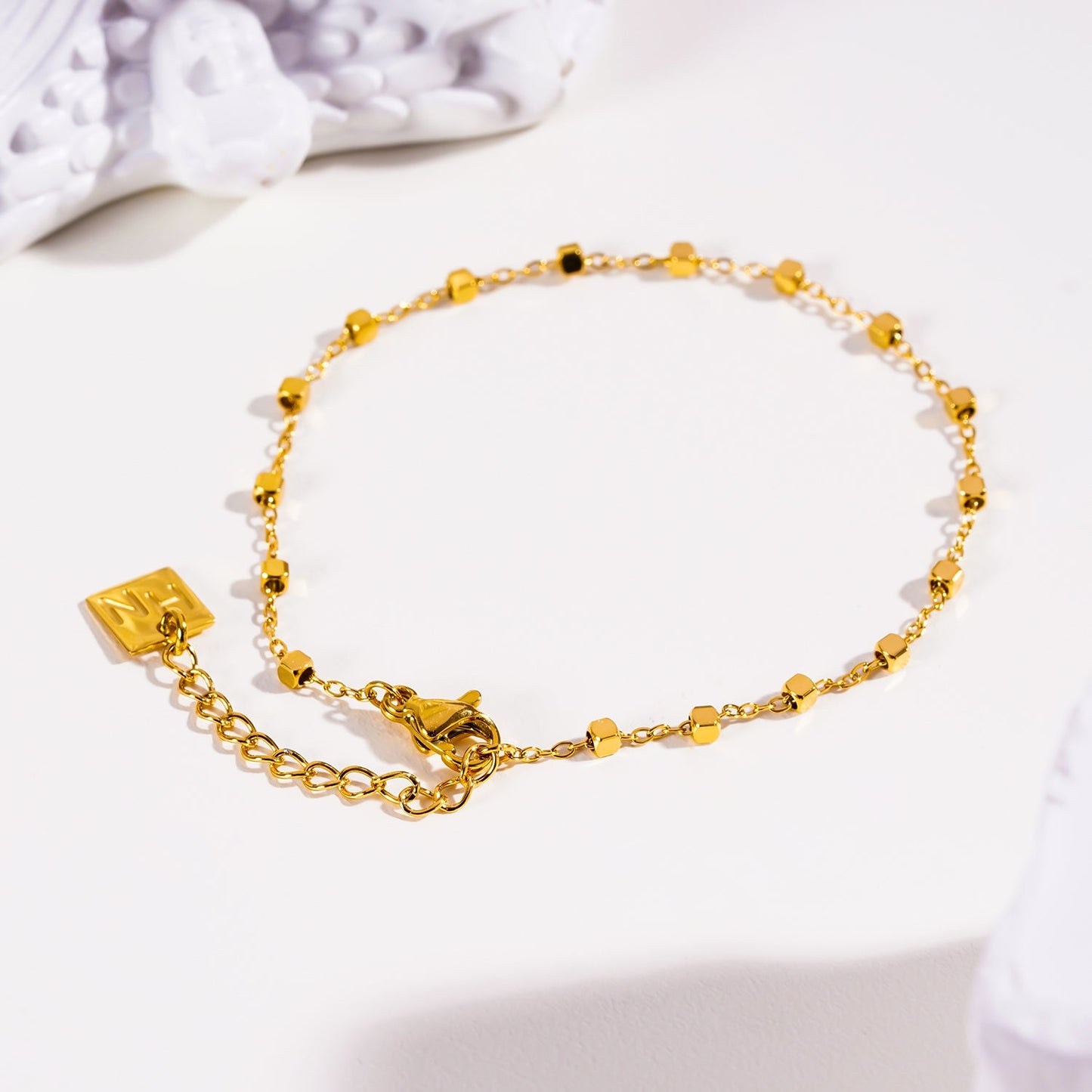 Style: DEMELZA: Essential Daily Bracelet with Delicate Square Beads.