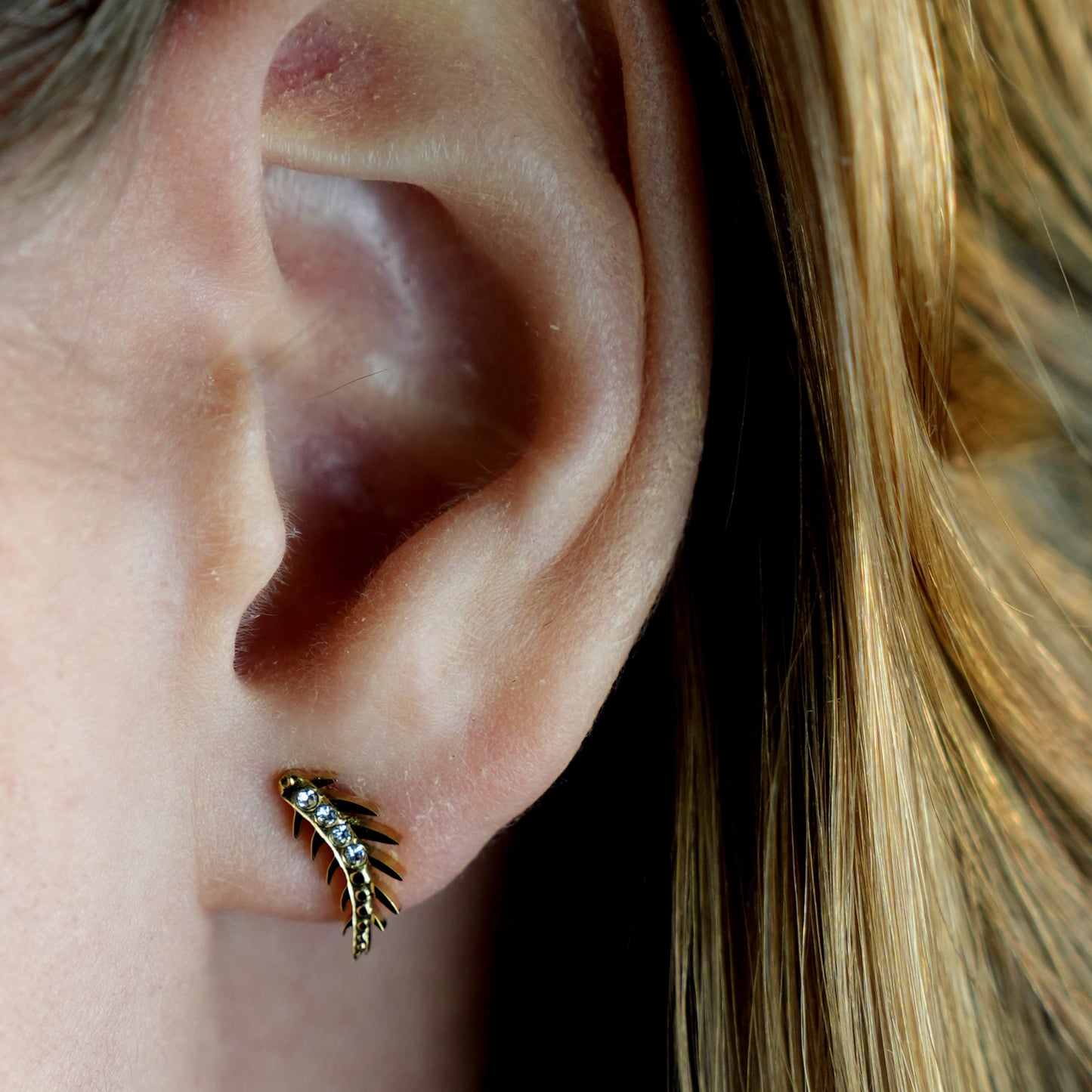 EBBA 'Flying Meteor' Curved Shaped Zirconia Stud Earrings.