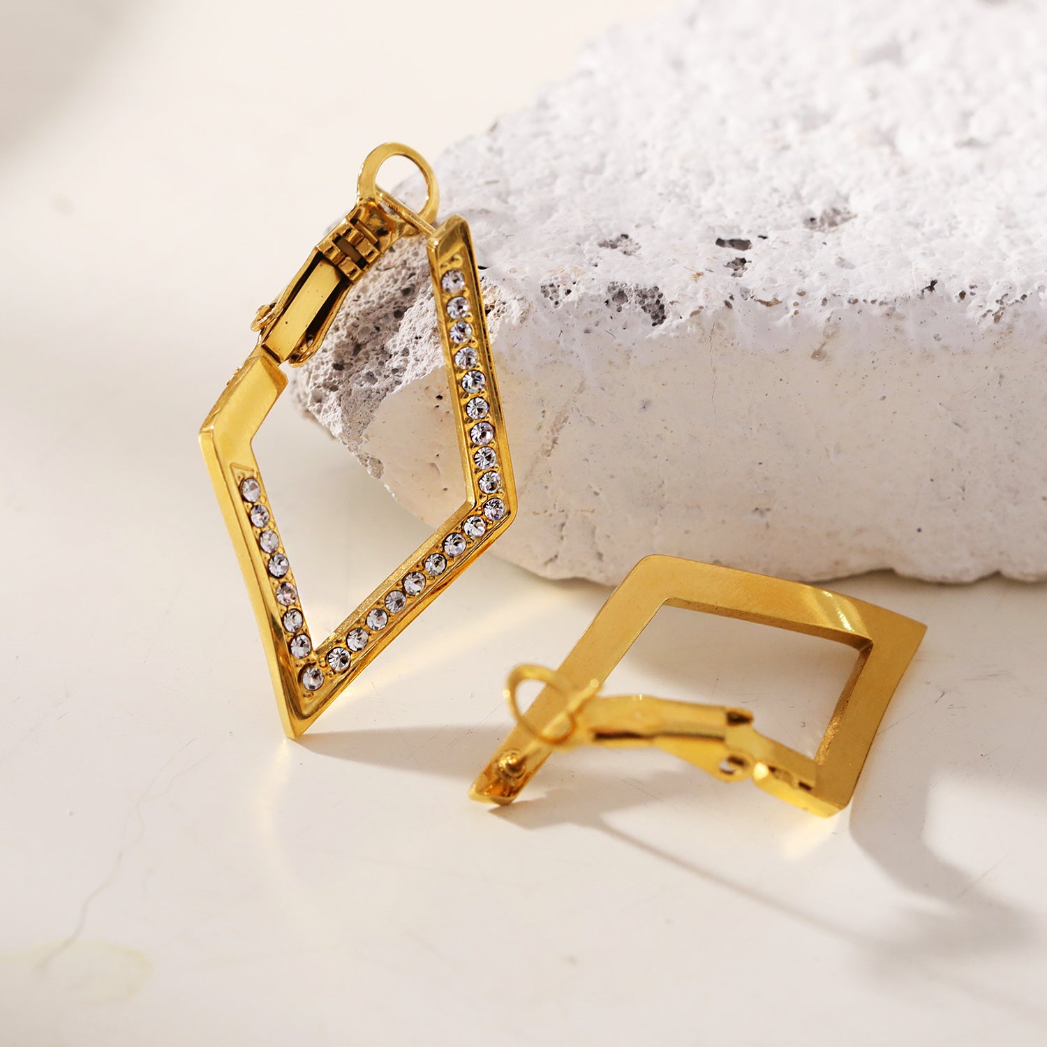 ALMA: Twisted Diamond Shaped Hoop Earrings Embedded with Zirconia Gemstones