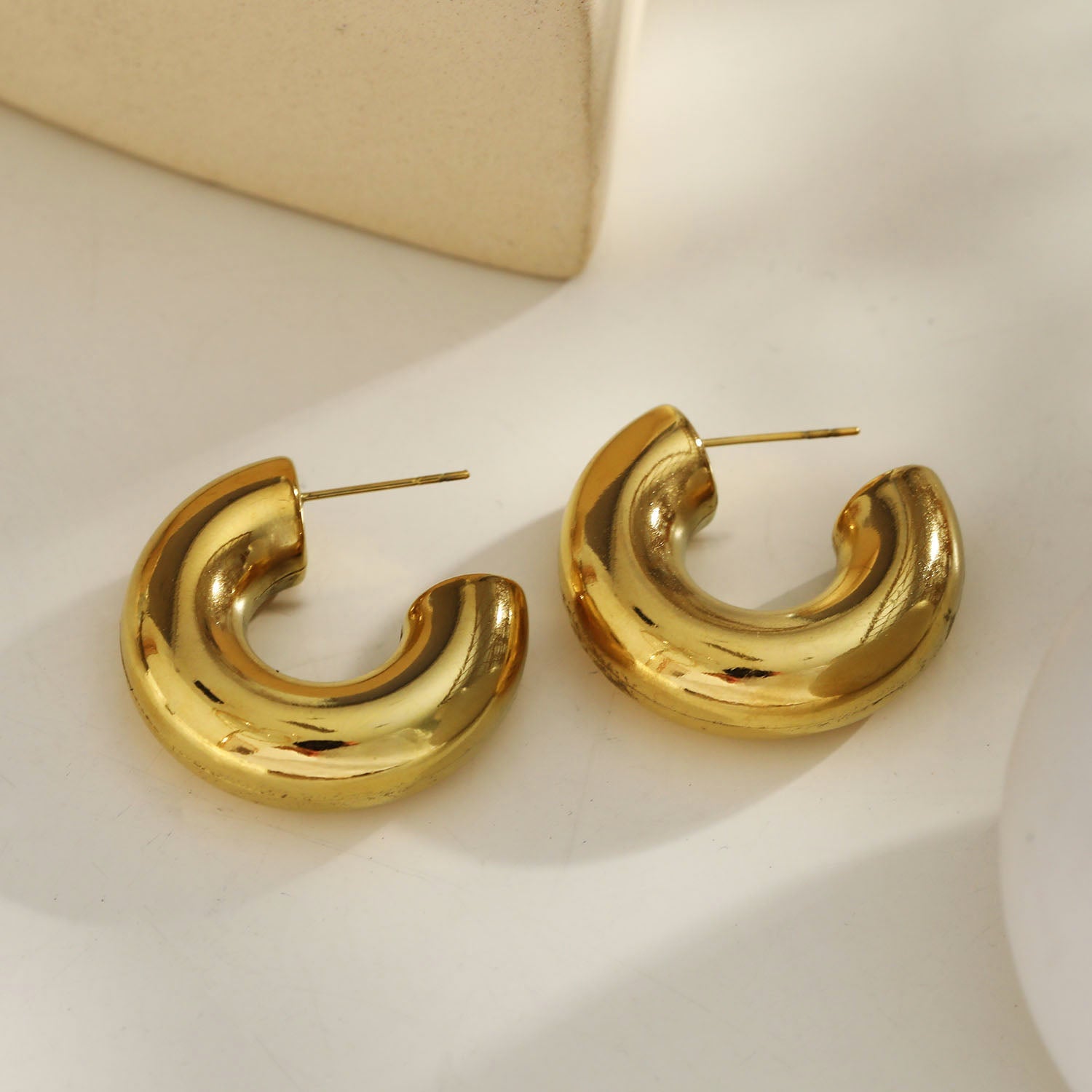 Style: DEMONTE 122246 Chunky Smooth Surface Hoop Earrings.