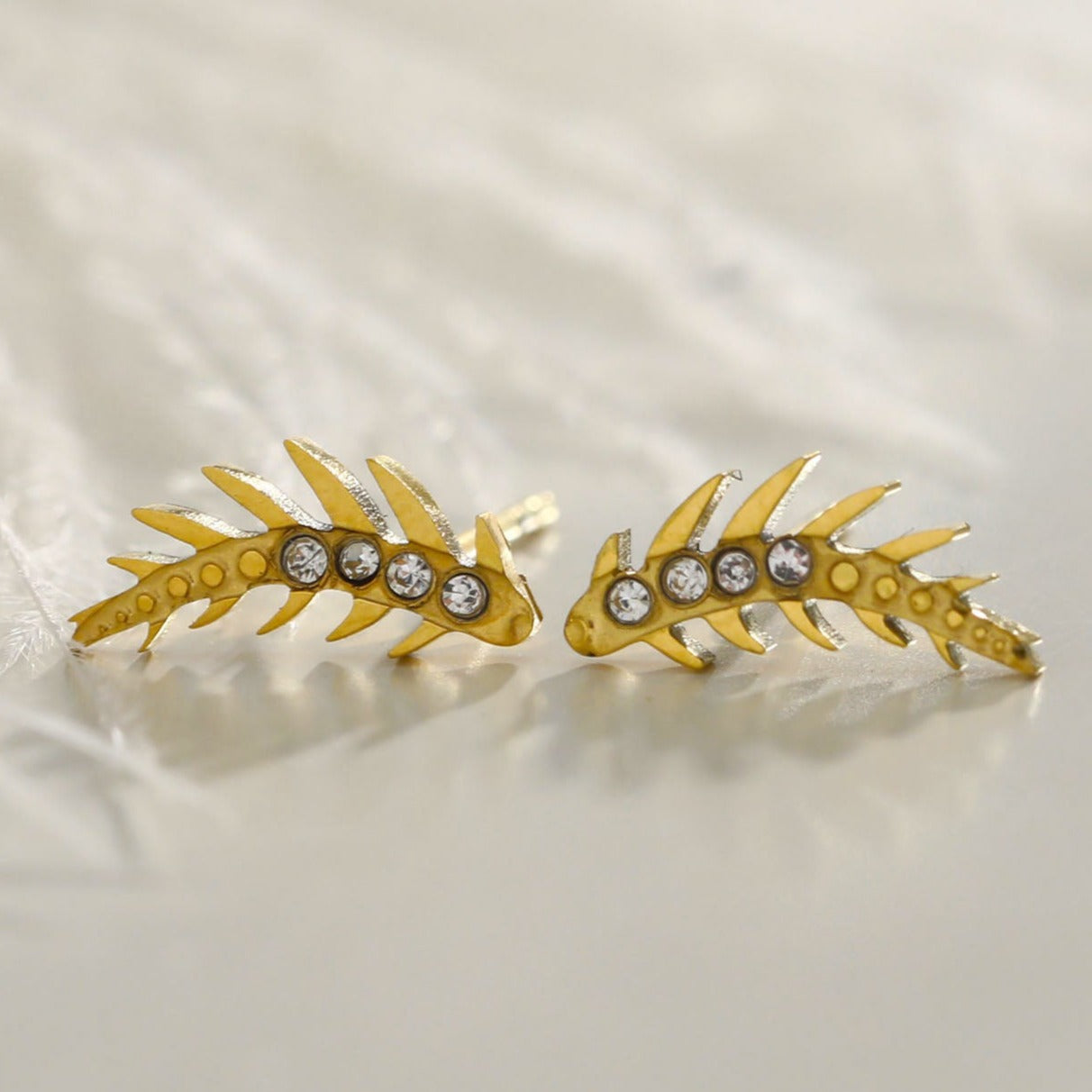 EBBA 'Flying Meteor' Curved Shaped Zirconia Stud Earrings.